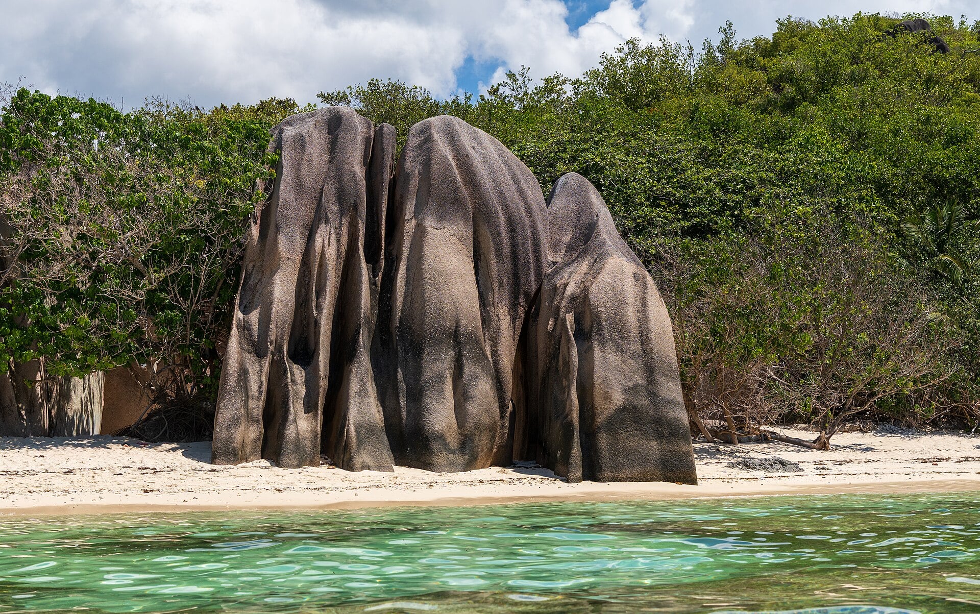 Granite boulders and clear water at Anse Source d'Argent, La Digue, Seychelles.