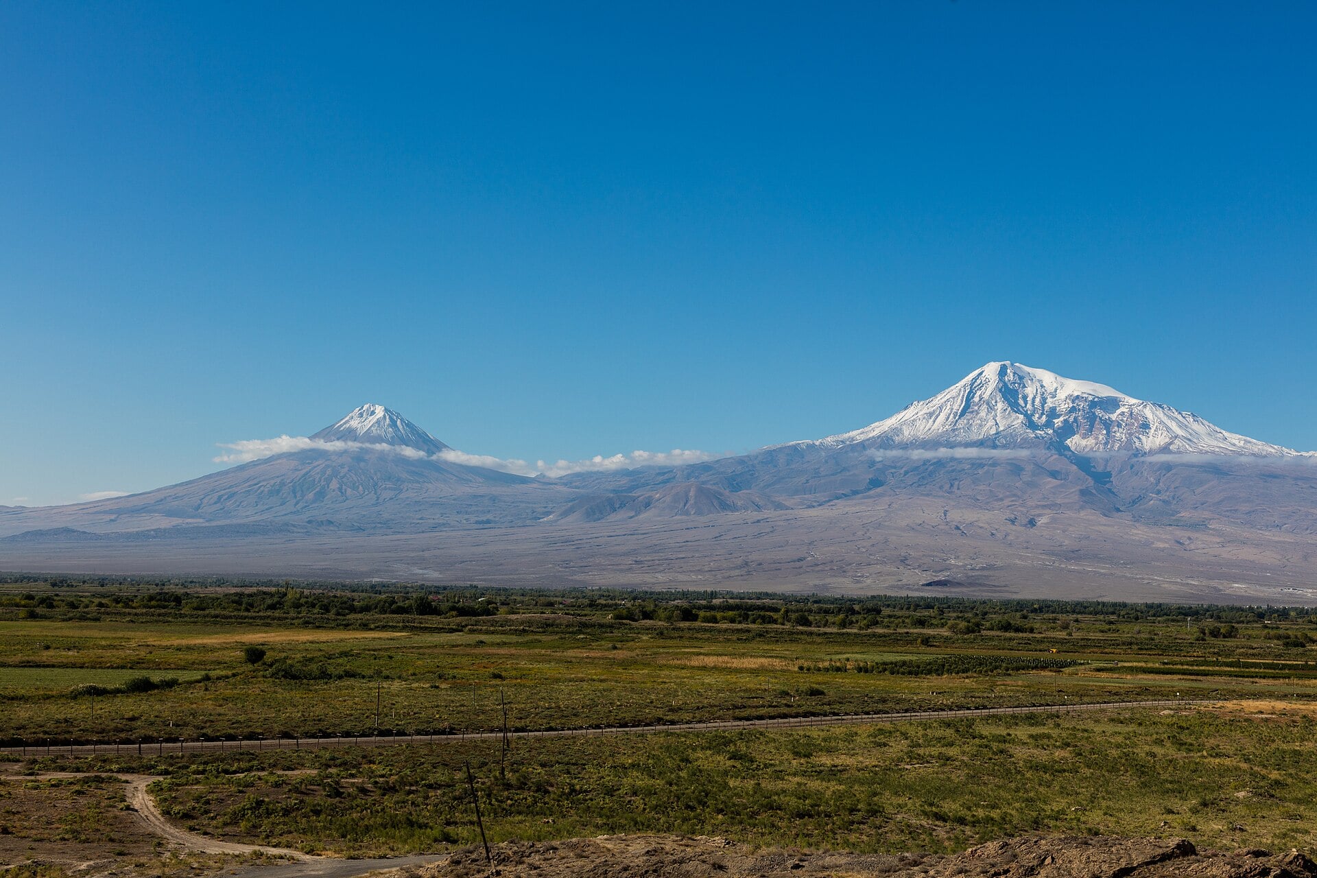 Khor Virap monastery with snow-capped Mount Ararat behind it, Armenia.