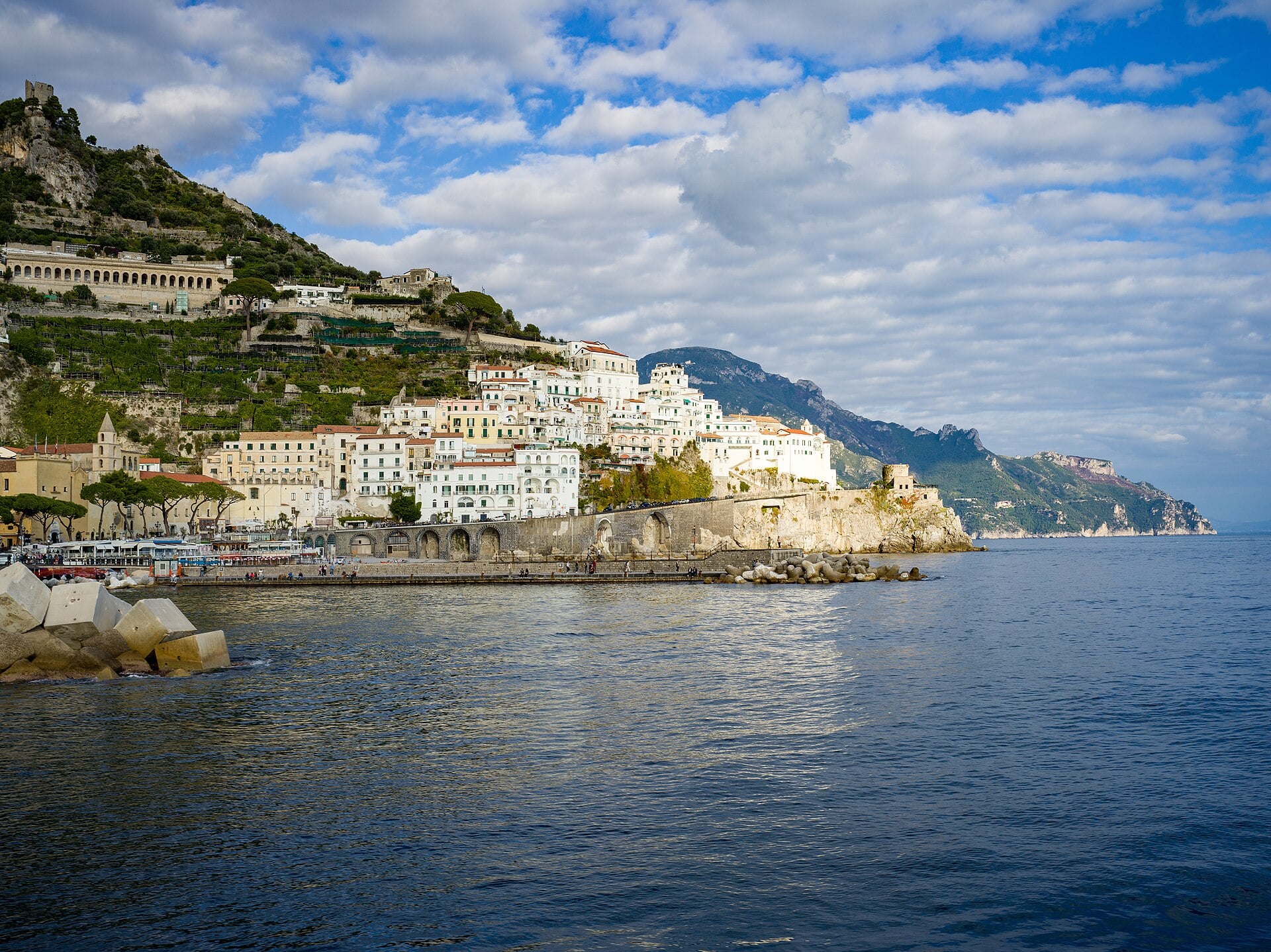 Pastel houses of Positano stacked above the Amalfi Coast, Italy.