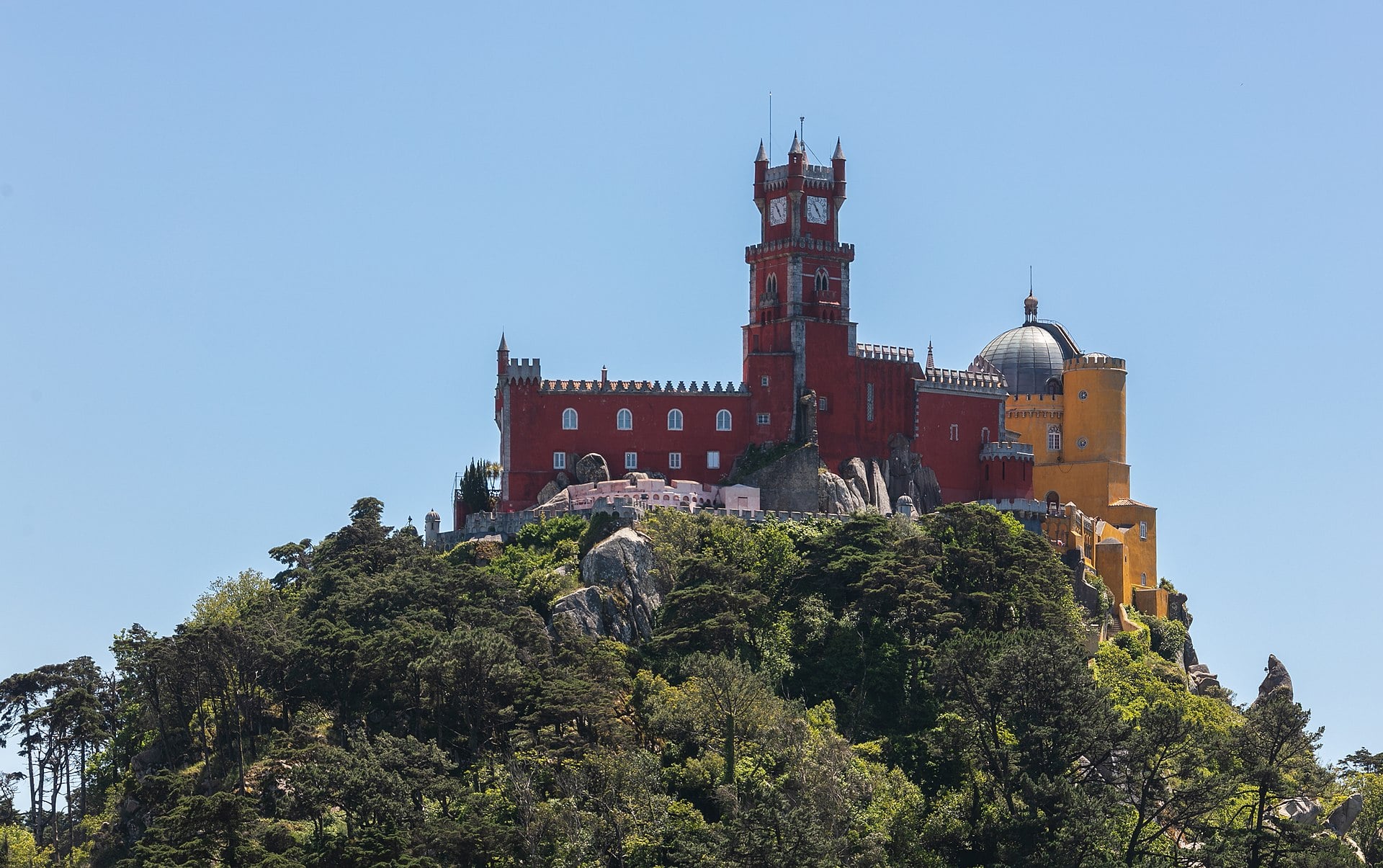 The painted Pena Palace on its hilltop in Sintra, Portugal.