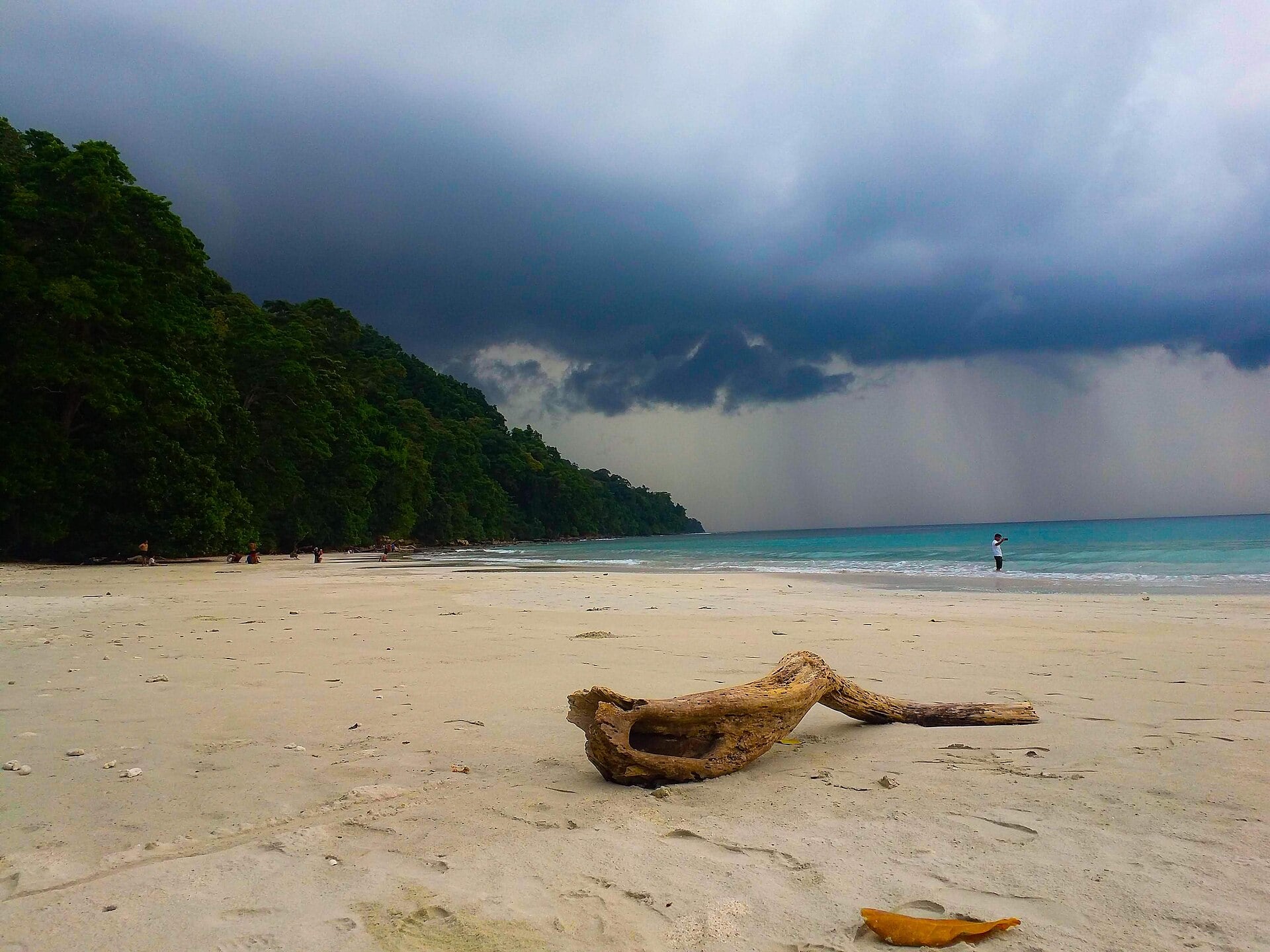 A squall crossing the bay at Radhanagar Beach, Havelock Island, in the Andamans.